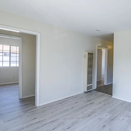 Rent this 3 bed house on 820 West 79th Street in Los Angeles, CA 90044