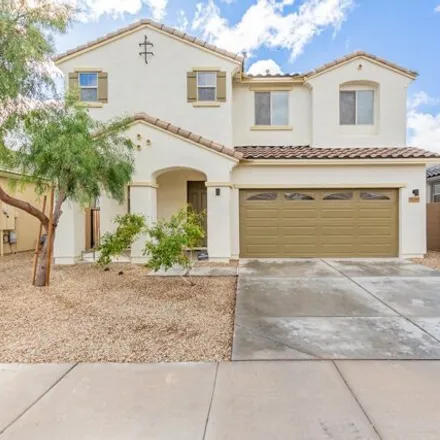 Rent this 4 bed house on West Mackamore Drive in Surprise, AZ 85001