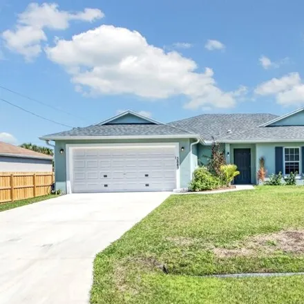 Buy this 4 bed house on 3859 Southwest Laidlow Street in Port Saint Lucie, FL 34953
