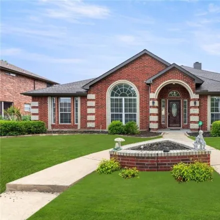 Buy this 4 bed house on 3214 Lochaven Dr in Rowlett, Texas