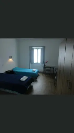 Rent this 26 bed room on Praça do Comércio 22 in 3000-116 Coimbra, Portugal