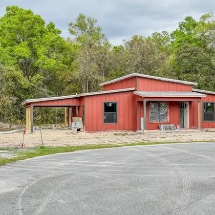 Buy this 3 bed house on 17206 Northwest 80th Avenue in Levy County, FL 32693