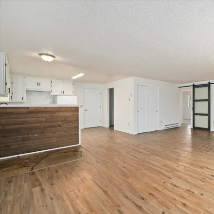Rent this 3 bed condo on 3812 S Gulley Ave.