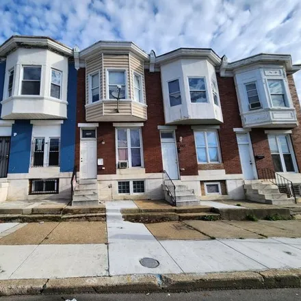 Buy this 4 bed townhouse on 2704 Harlem Avenue in Baltimore, MD 21216