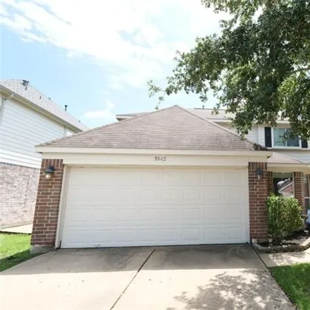 Rent this 4 bed house on 5042 Oak Stand Ct in Katy, Texas