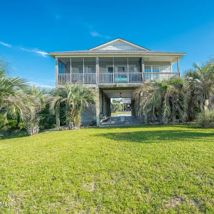Buy this 3 bed house on Ocean Crest Motel in 1417 East Beach Drive, Oak Island