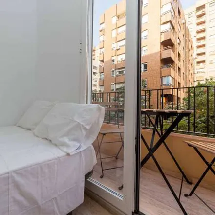 Rent this 6 bed apartment on Carrer d'Ernest Ferrer in 13, 46021 Valencia