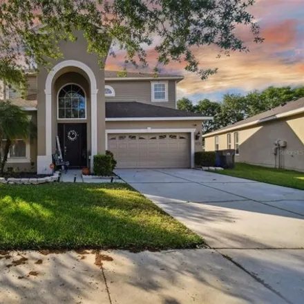 Buy this 4 bed house on 7910 Camden Woods Drive in Progress Village, Hillsborough County