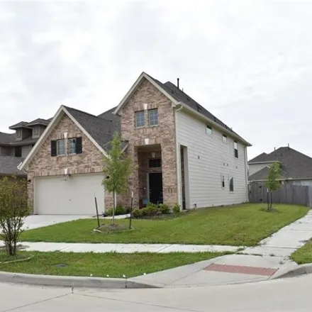Rent this 4 bed house on Meandering Elm Trail in Houston, TX 77045
