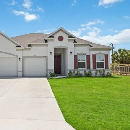 Buy this 4 bed house on Pomello Avenue in Palm Bay, FL