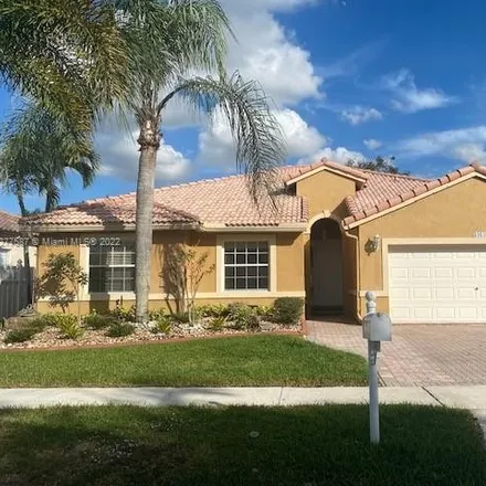 Rent this 4 bed house on 3461 Southwest 142nd Avenue in Miramar, FL 33027