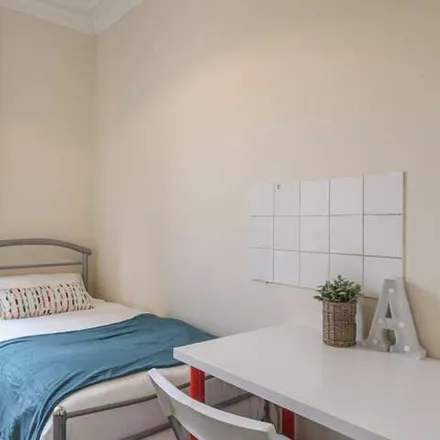Rent this 8 bed apartment on 232 Kilburn High Road in London, NW6 7JG