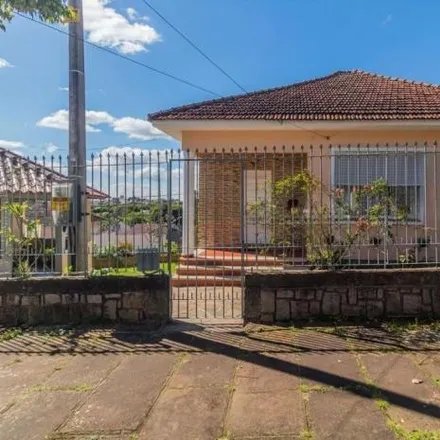 Buy this 3 bed house on Rua Arnaldo Balve in Jardim Itu, Porto Alegre - RS