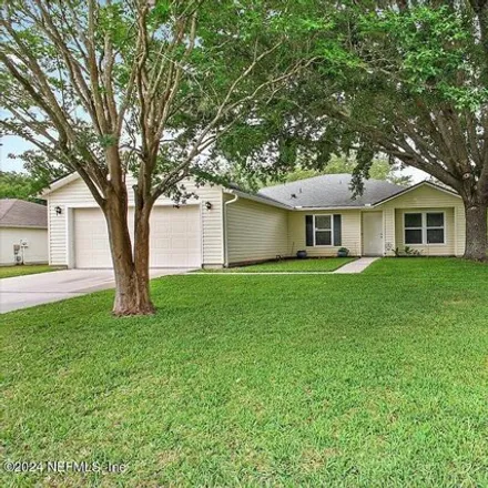Buy this 4 bed house on 786 Roland Lakes Drive in Jacksonville, FL 32220