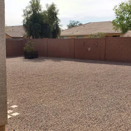 Rent this 3 bed apartment on 2007 West Half Moon Circle in Pinal County, AZ 85142