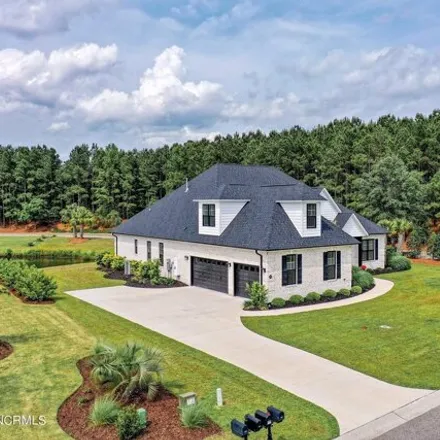 Buy this 5 bed house on 2067 Wind Lake Way in Leland, NC 28451