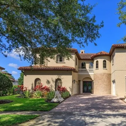 Buy this 6 bed house on 5739 Emerson Pointe Way in Bay Hill, Doctor Phillips