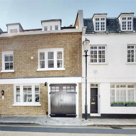 Rent this 3 bed townhouse on 34 Cadogan Lane in London, SW1X 9EJ