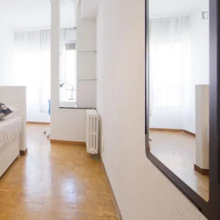 Rent this 6 bed room on Calle de Mauricio Legendre in 6, 28036 Madrid