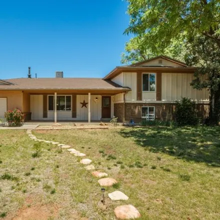 Buy this 5 bed house on 7734 Comanche Road Northeast in Albuquerque, NM 87110
