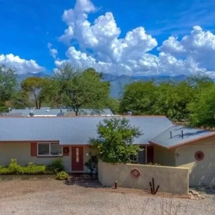 Buy this 4 bed house on 5685 East Water Street in Tucson, AZ 85712