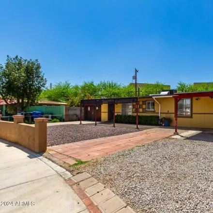 Buy this 5 bed house on 3937 West Almeria Road in Phoenix, AZ 85009