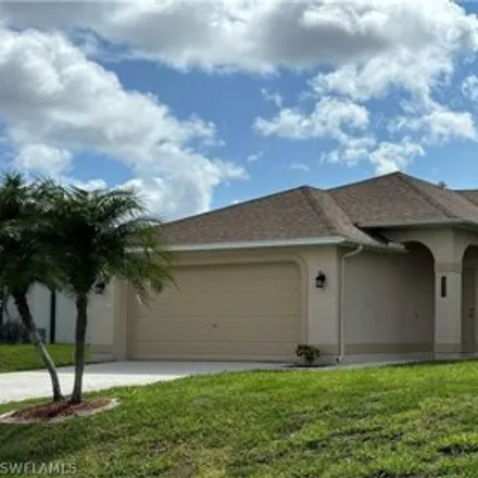 Rent this 4 bed house on 2702 NW 3rd Pl in Cape Coral, Florida