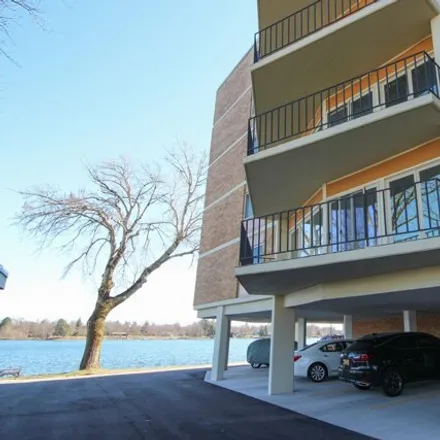 Buy this 2 bed condo on Draper Hall in 333 North Lake Road, Oconomowoc