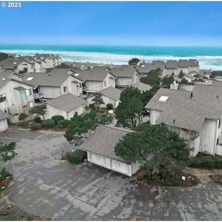 Buy this 2 bed condo on Searidge Drive in Lincoln Beach, OR