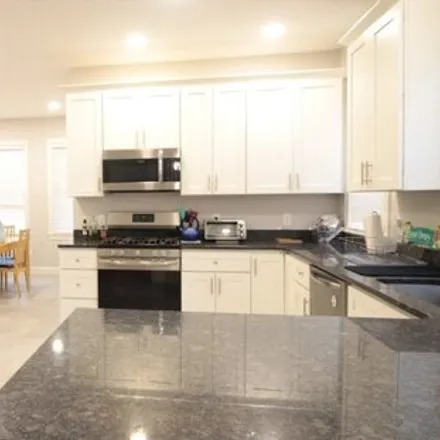 Rent this 4 bed apartment on Coolidge Corner Clubhouse in Harvard Street, Brookline