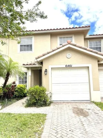 Rent this 3 bed house on 6433 Park Lake Circle in Palm Beach County, FL 33437