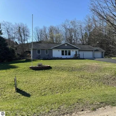 Buy this 3 bed house on 11456 Orchard Drive in Milton Township, MI 49676