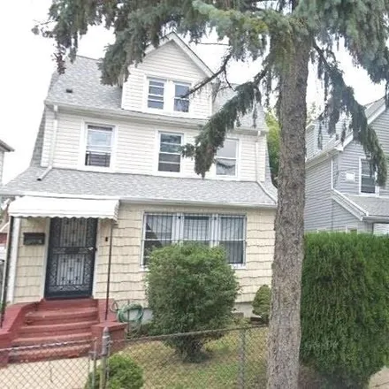 Buy this 4 bed house on 215-11 111th Road in New York, NY 11429