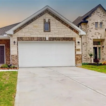 Rent this 3 bed house on Astor Point Trail in Harris County, TX 77375
