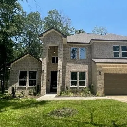 Buy this 4 bed house on 7396 Charred Pine Drive in Montgomery County, TX 77354