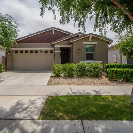 Rent this 4 bed house on 9841 East Timeless Avenue in Mesa, AZ 85212