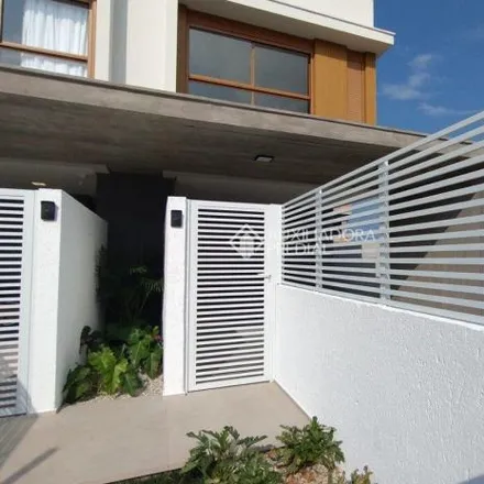 Rent this 4 bed house on Rua Jardim dos Eucaliptos in Campeche, Florianópolis - SC