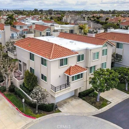 Rent this 4 bed condo on 19384 Merion Circle in Huntington Beach, CA 92648