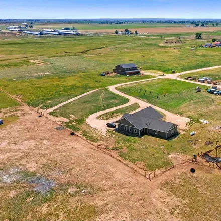 Buy this 4 bed house on 26353 County Road 52 in Weld County, CO 80644