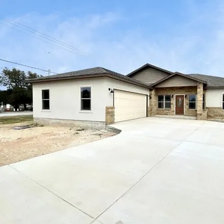 Buy this 3 bed house on 201 West Colonial Parkway in Devine, TX 78016
