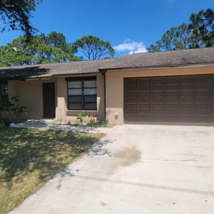 Rent this 3 bed house on 1037 Lamplighter Drive Northwest in Palm Bay, FL 32907