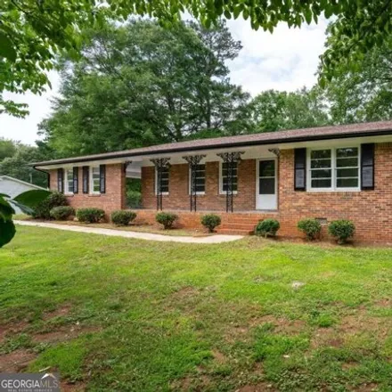 Buy this 3 bed house on 1377 Cherokee Trail Northwest in Gwinnett County, GA 30043