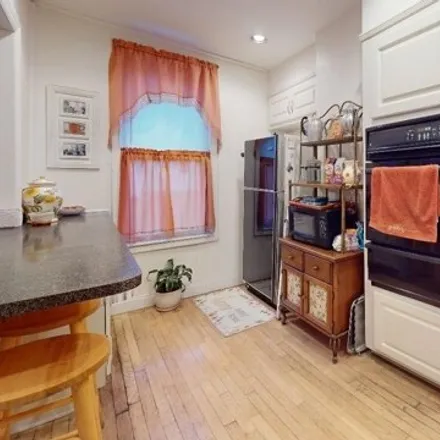 Image 5 - 78-24 68th Avenue, New York, NY 11379, USA - House for sale
