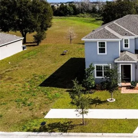 Buy this 4 bed house on 3058 Sunscape Terrace in Groveland, FL 34736