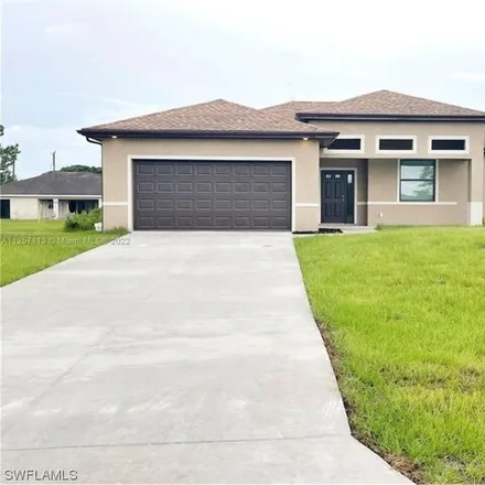 Buy this 4 bed house on 3679 21st Street Southwest in Lehigh Acres, FL 33976