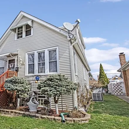 Buy this 4 bed house on 3331 North Natchez Avenue in Chicago, IL 60634