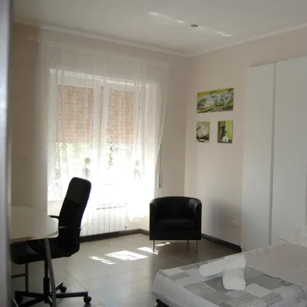Rent this 4 bed room on Viale dello Scalo San Lorenzo in 00182 Rome RM, Italy