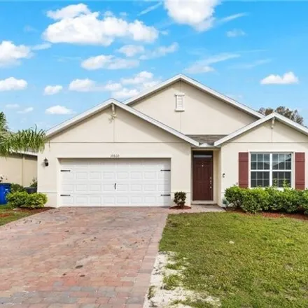 Buy this 4 bed house on 10577 Crossback Lane in Lehigh Acres, FL 33936