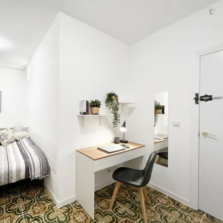 Rent this 9 bed room on La Barbería de Madrid in Calle del Dos de Mayo, 28004 Madrid