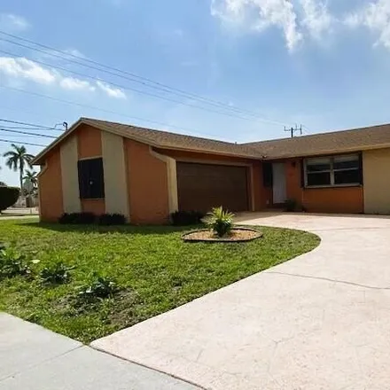 Rent this 3 bed house on 2901 Avenue O in Riviera Beach, FL 33404